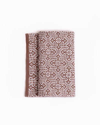 Elegant beige scarf with a detailed brown geometric pattern and solid brown edges, displayed on a white background, showcasing the intricate design and sophisticated style
