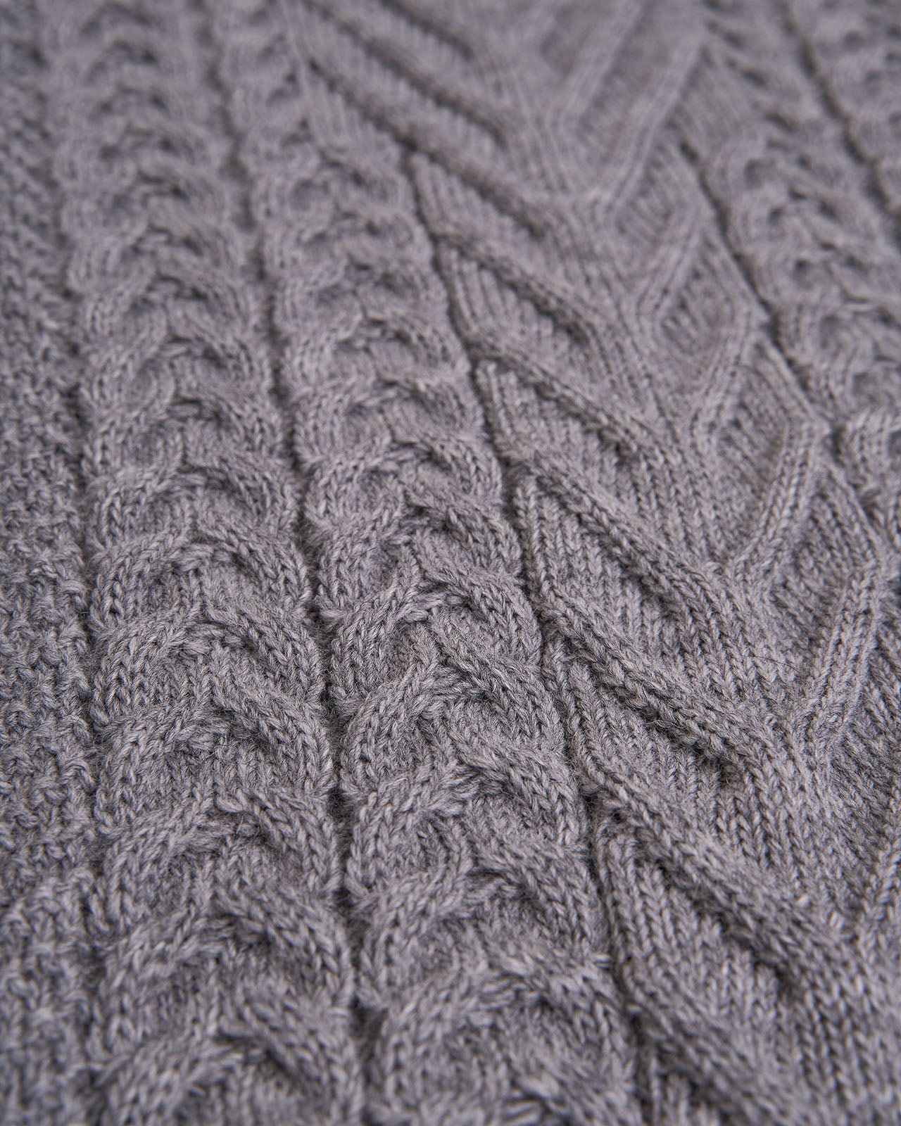 Details of women's wool braided sweater
